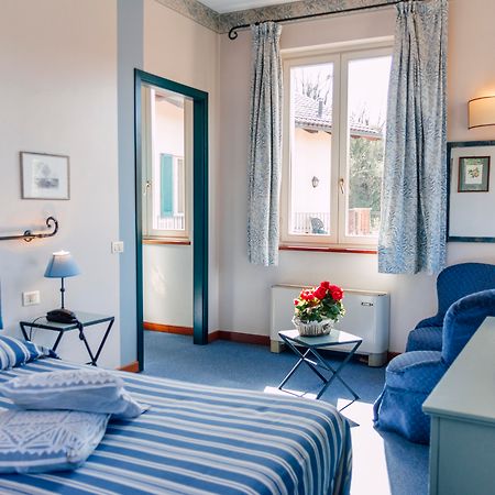 Hostellerie Du Golf Pecetto Bagian luar foto