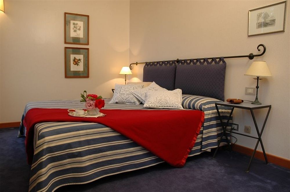 Hostellerie Du Golf Pecetto Bagian luar foto