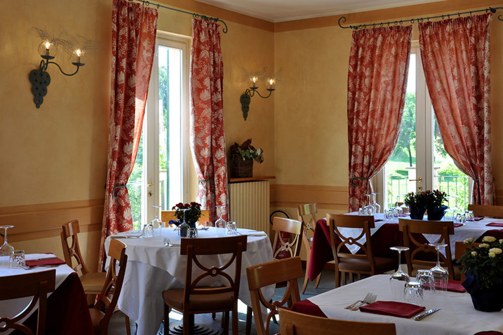 Hostellerie Du Golf Pecetto Bagian luar foto
