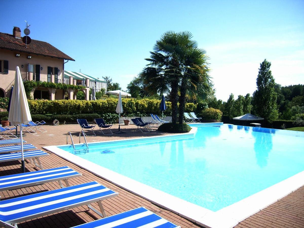 Hostellerie Du Golf Pecetto Bagian luar foto